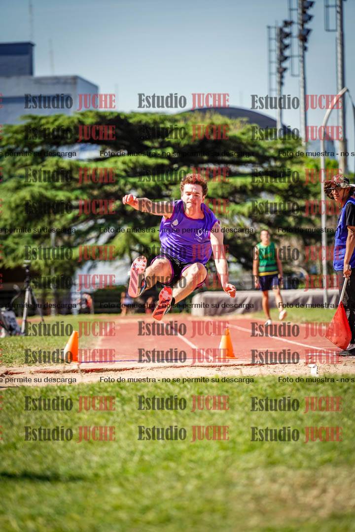 Fotos del salto en largo de varones