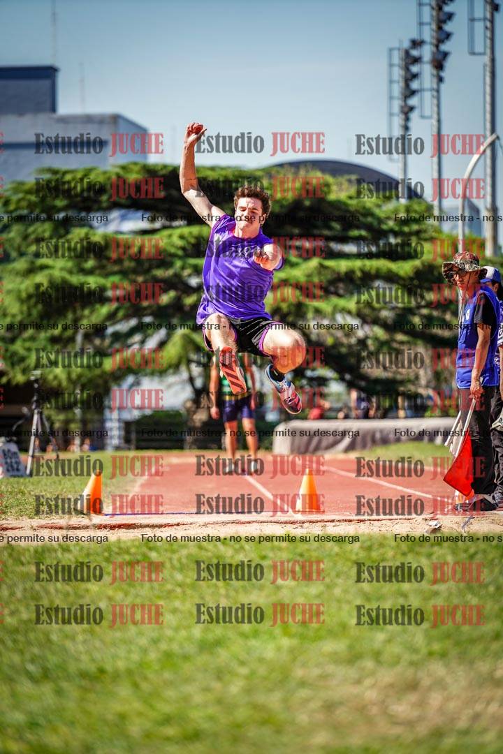 Fotos del salto en largo de varones