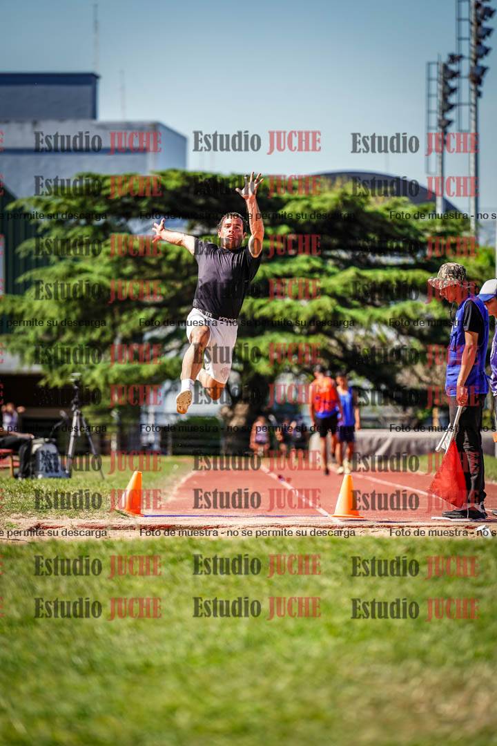 Fotos del salto en largo de varones
