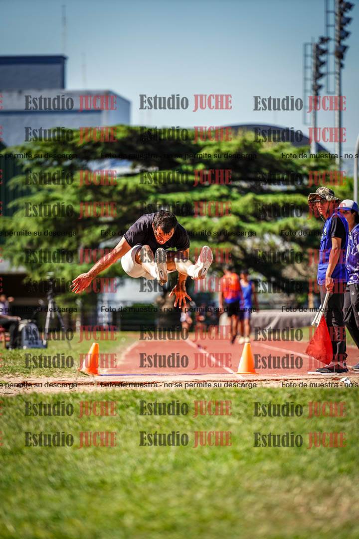 Fotos del salto en largo de varones