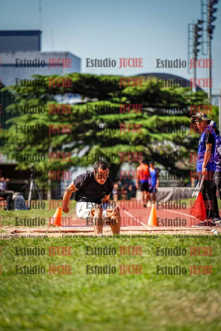 Fotos del salto en largo de varones