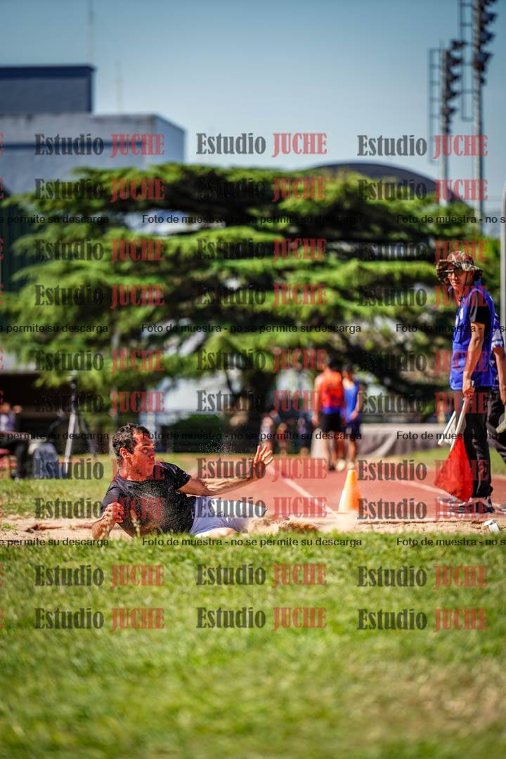 Fotos del salto en largo de varones