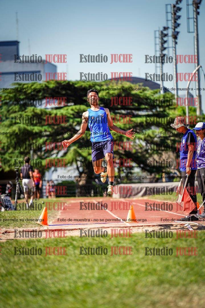 Fotos del salto en largo de varones