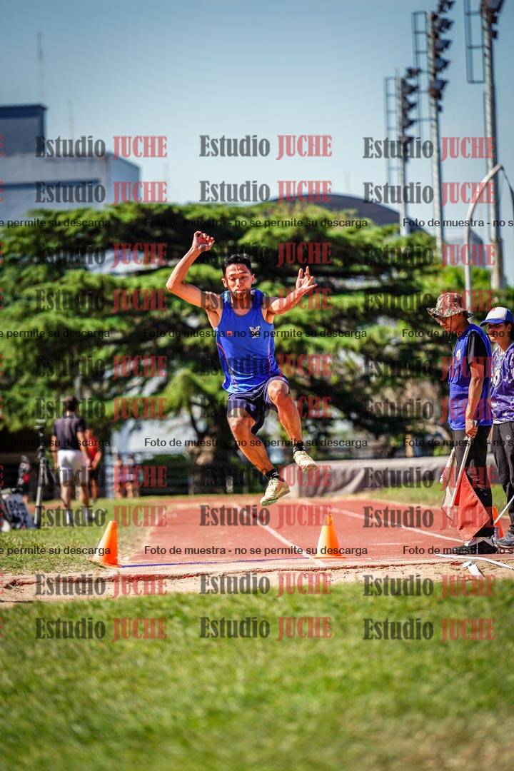 Fotos del salto en largo de varones