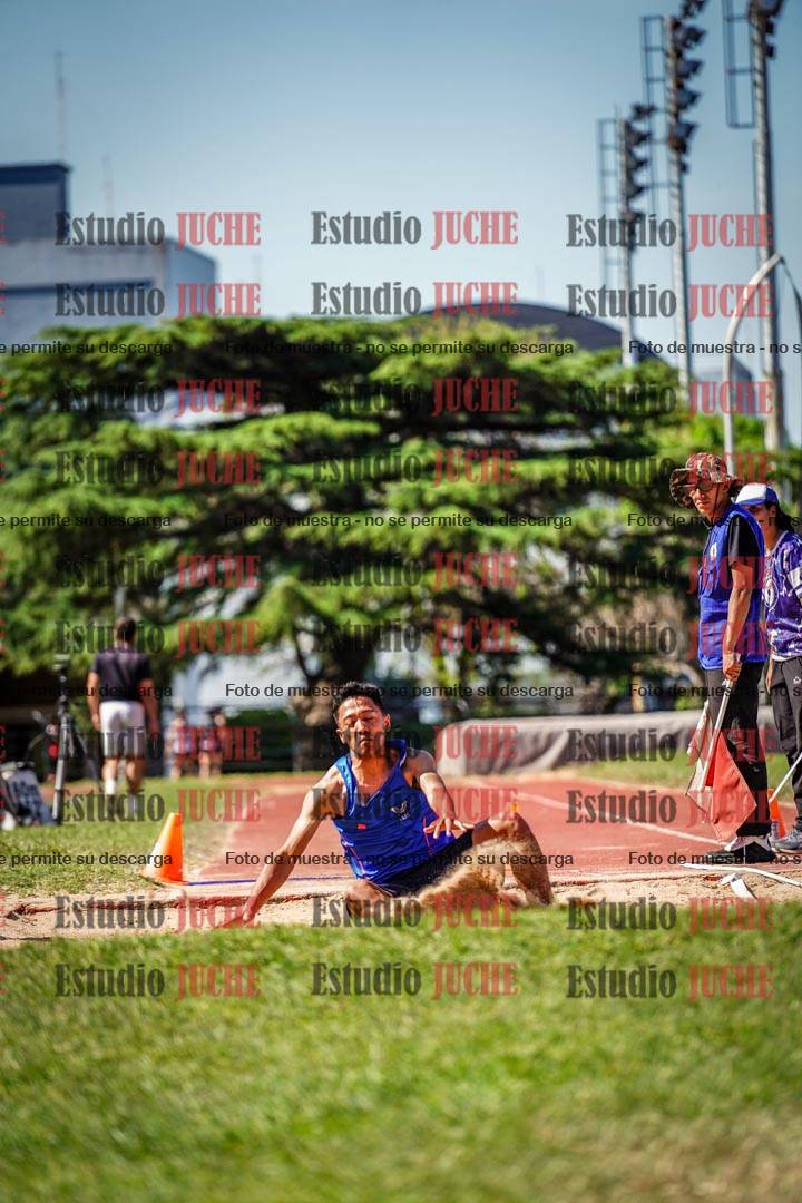 Fotos del salto en largo de varones