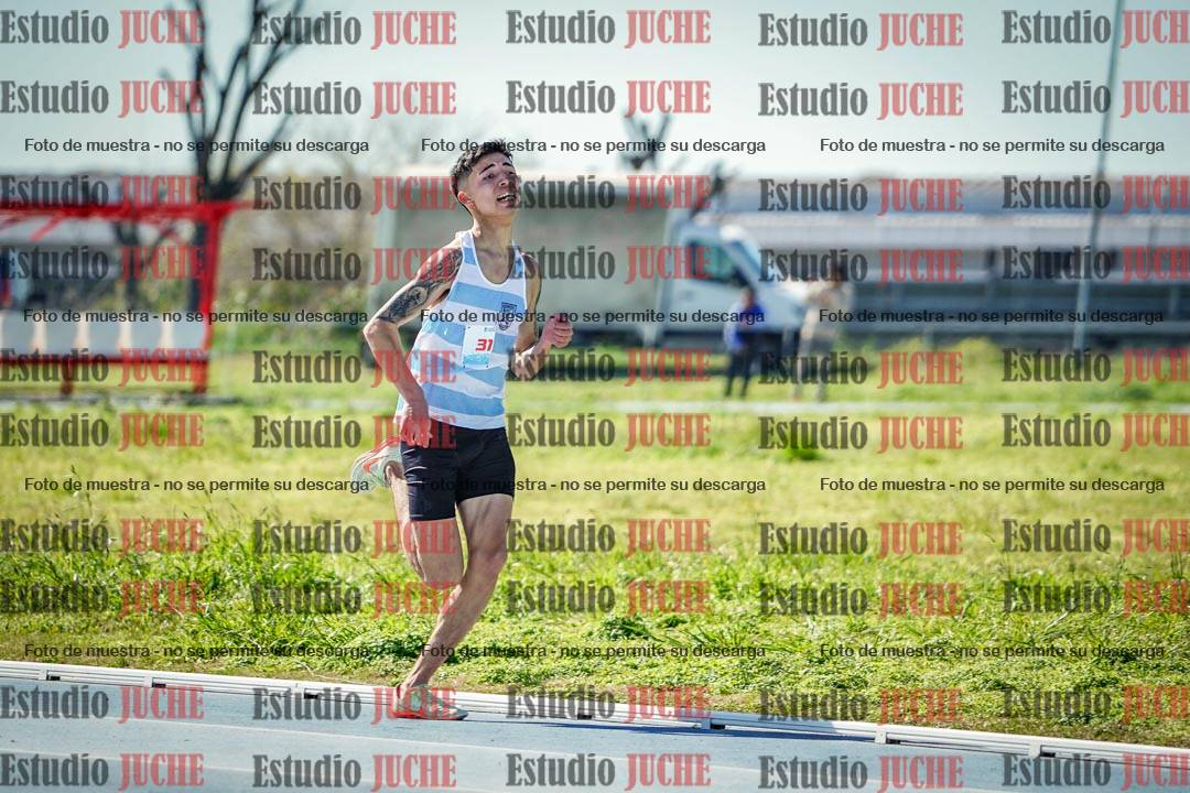 Fotos de los 5000 m llanos de mujeres y varones