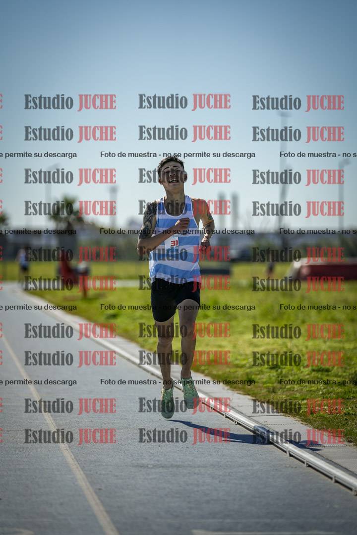 Fotos de los 5000 m llanos de mujeres y varones