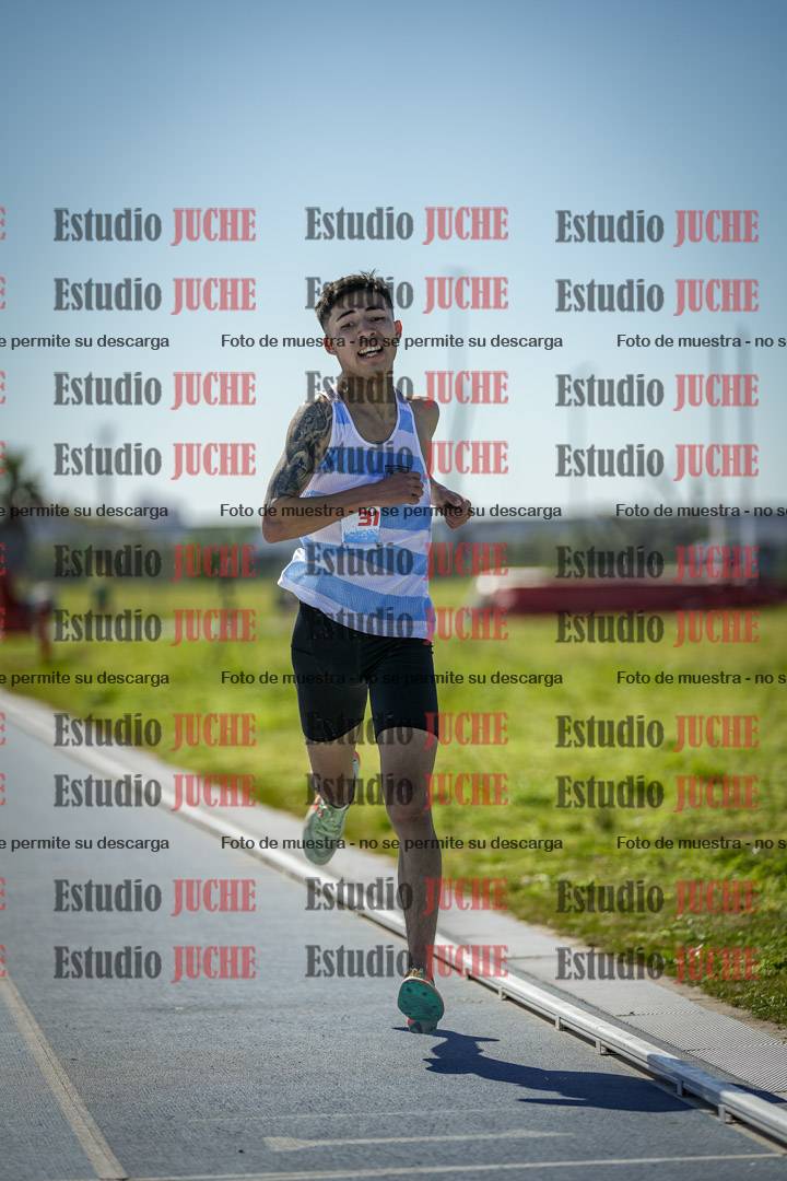 Fotos de los 5000 m llanos de mujeres y varones