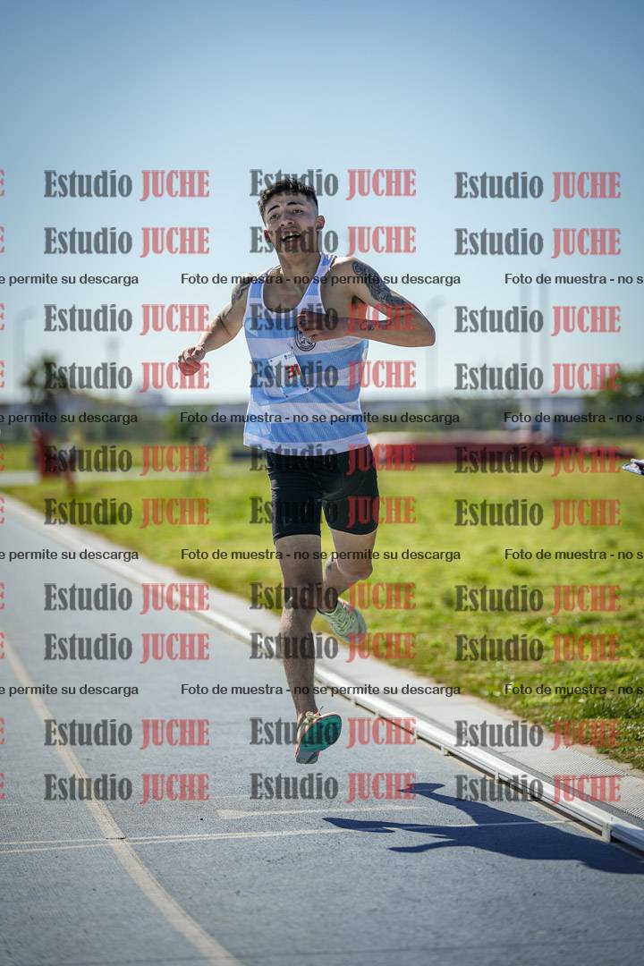 Fotos de los 5000 m llanos de mujeres y varones