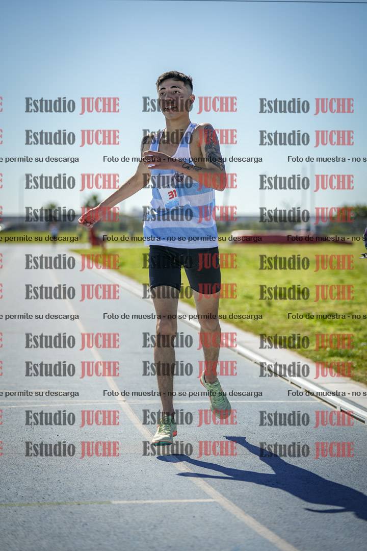 Fotos de los 5000 m llanos de mujeres y varones