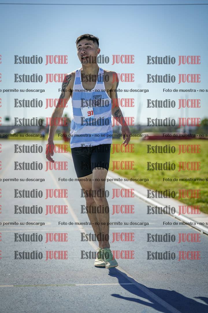 Fotos de los 5000 m llanos de mujeres y varones