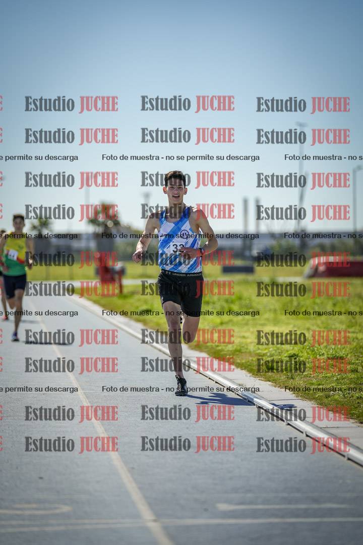 Fotos de los 5000 m llanos de mujeres y varones