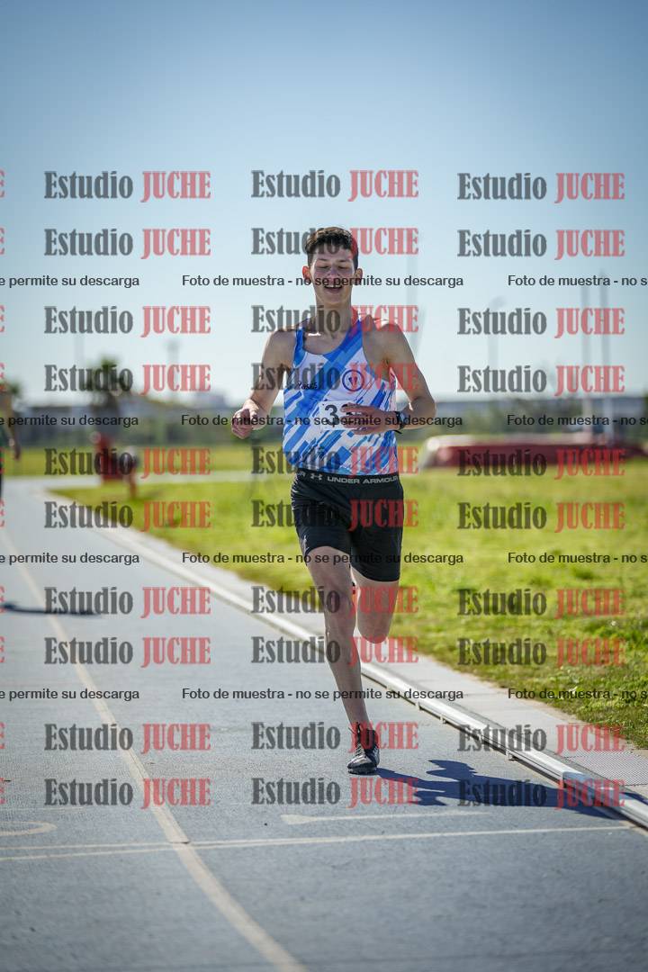 Fotos de los 5000 m llanos de mujeres y varones