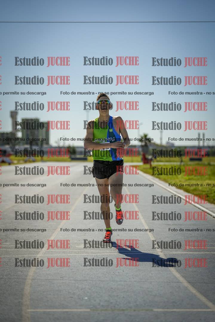 Fotos de los 5000 m llanos de mujeres y varones