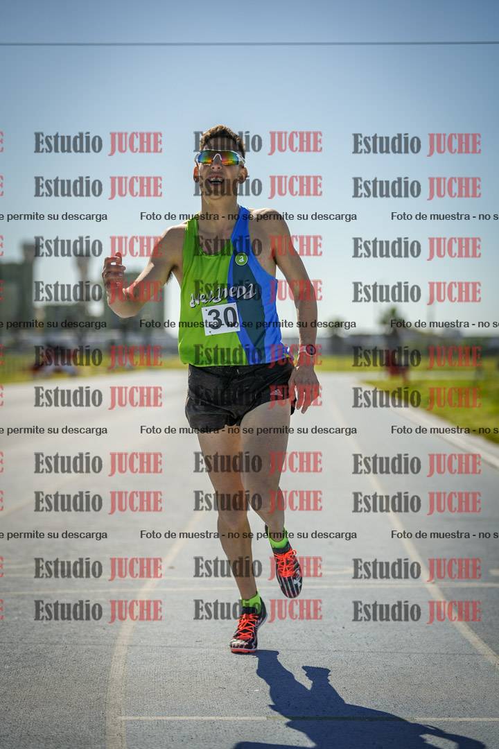 Fotos de los 5000 m llanos de mujeres y varones