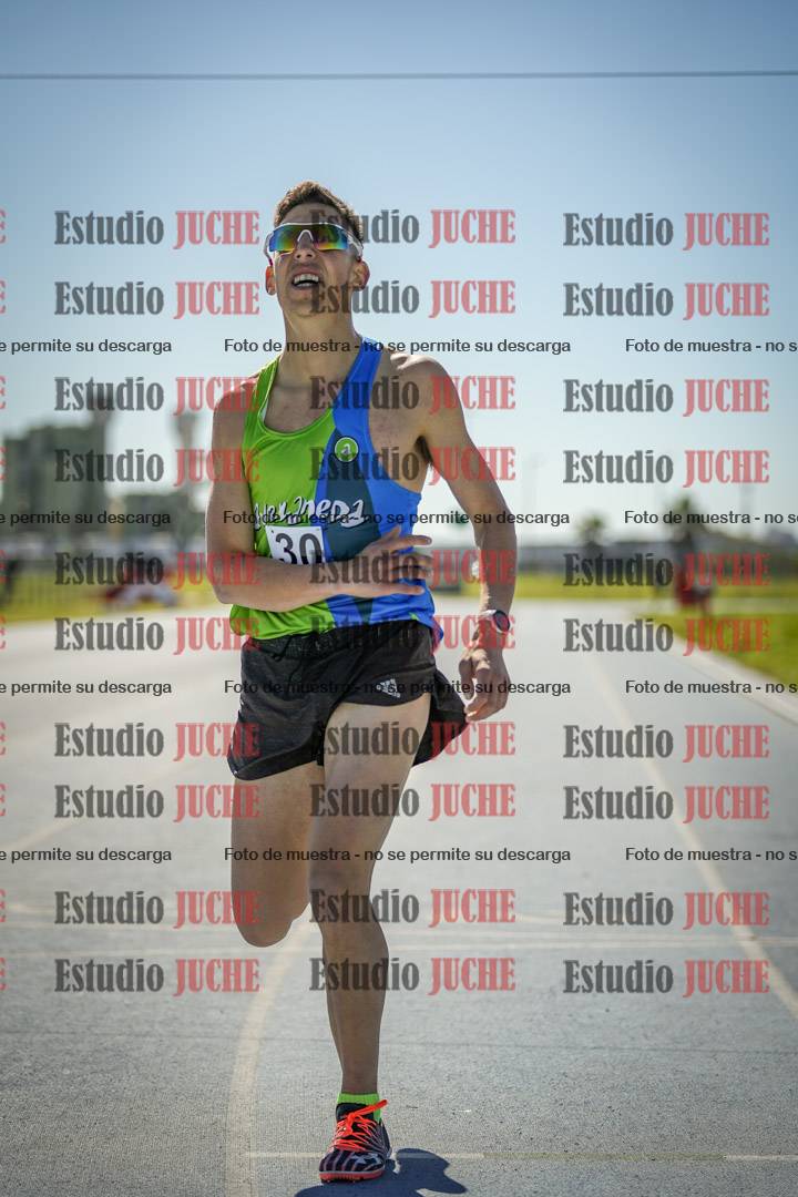 Fotos de los 5000 m llanos de mujeres y varones