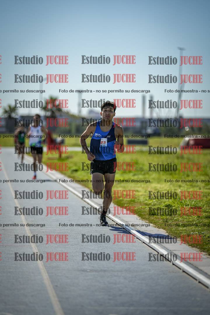 Fotos de los 5000 m llanos de mujeres y varones