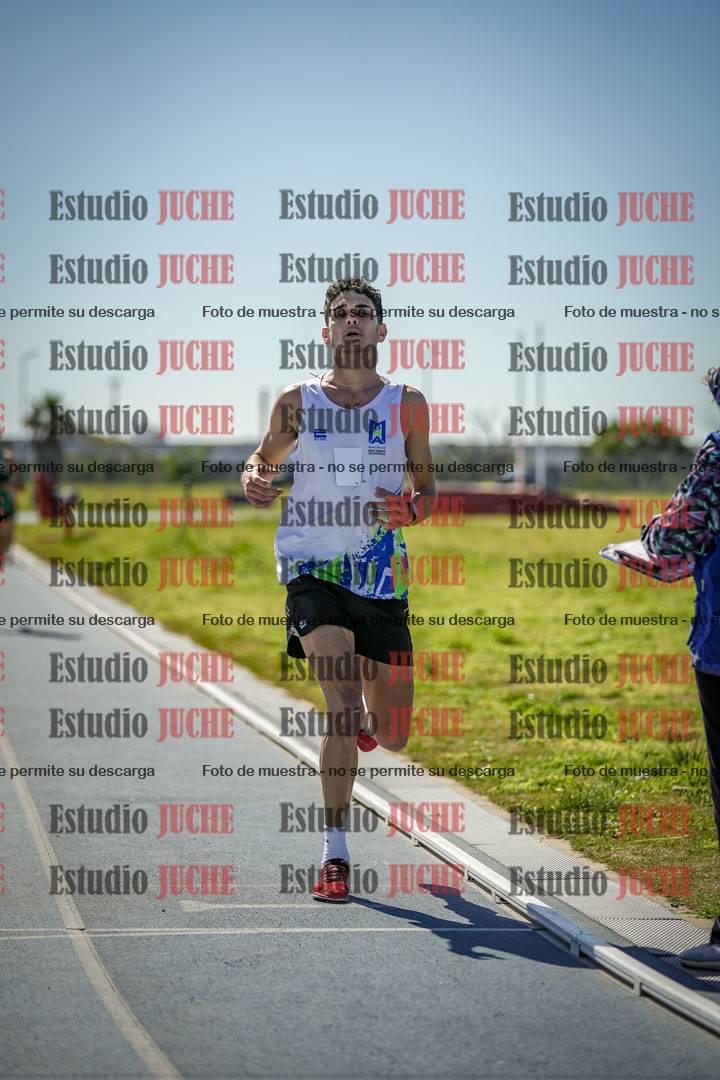 Fotos de los 5000 m llanos de mujeres y varones
