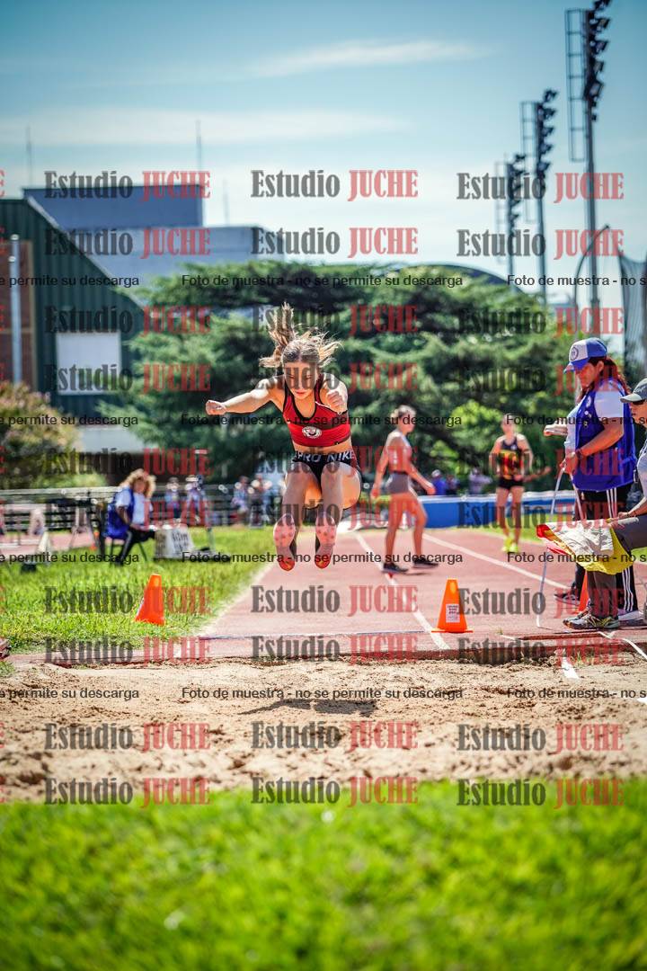 Fotos del salto en largo de mujeres