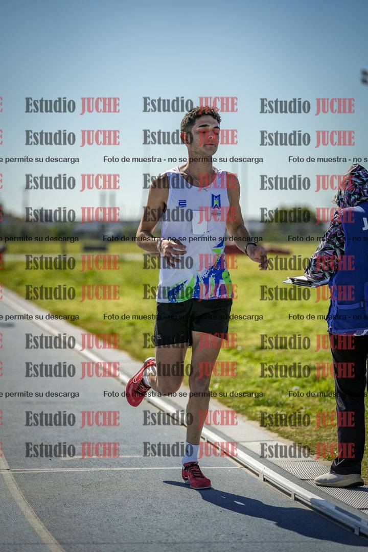 Fotos de los 5000 m llanos de mujeres y varones