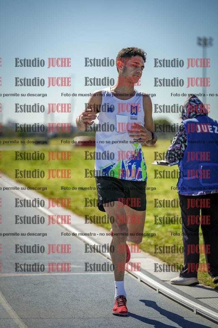 Fotos de los 5000 m llanos de mujeres y varones