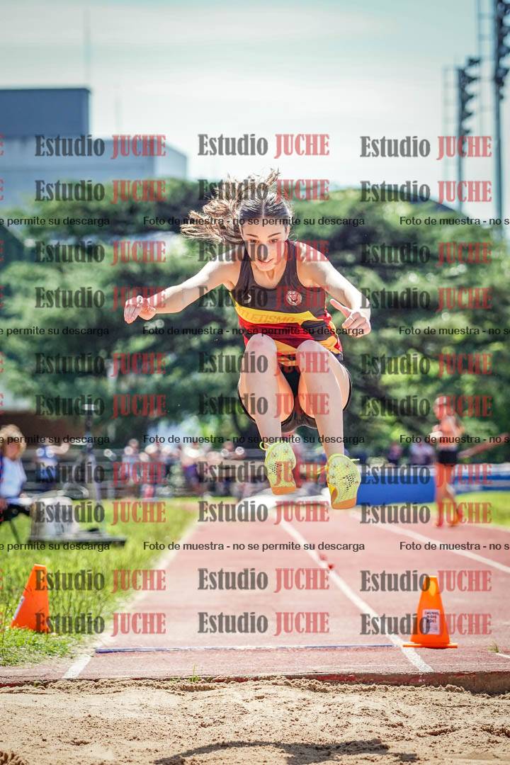 Fotos del salto en largo de mujeres