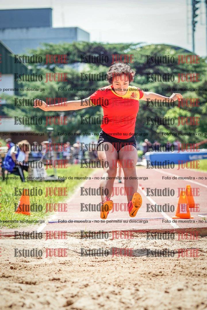 Fotos del salto en largo de mujeres