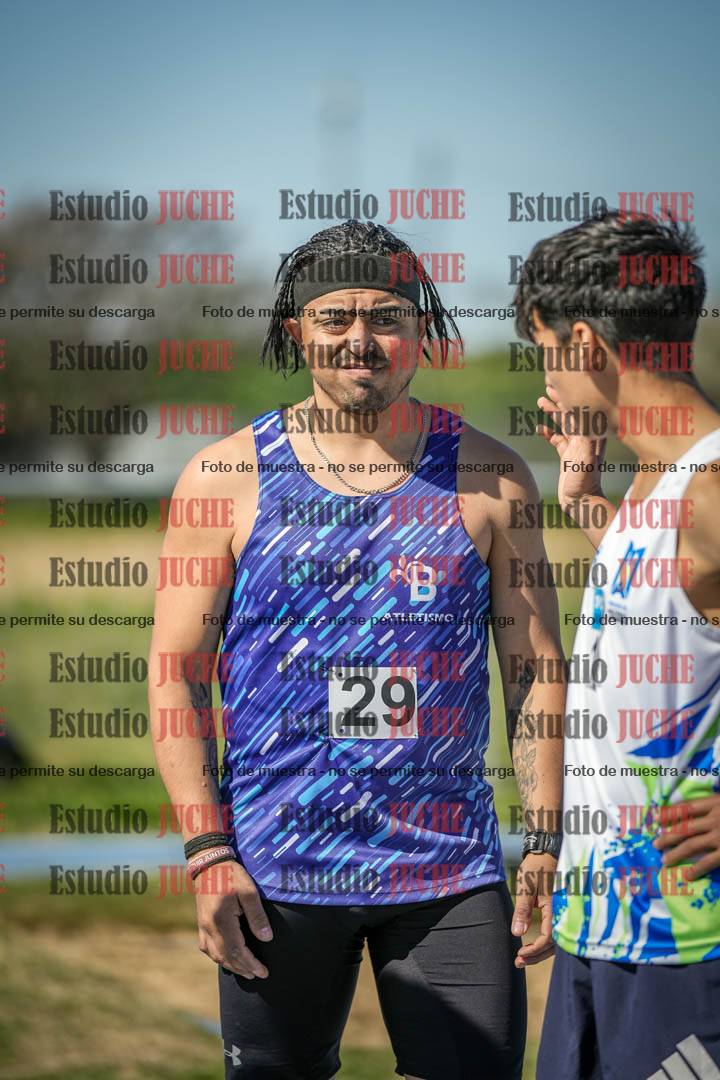 Fotos de los 5000 m llanos de mujeres y varones