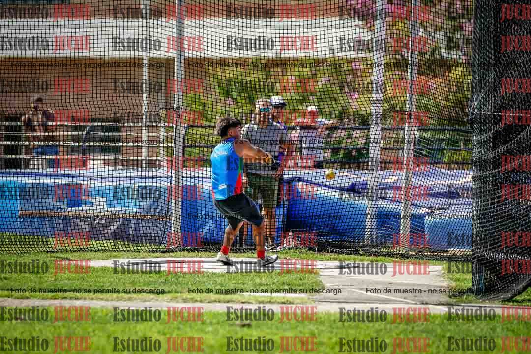 Fotos del lanzamiento de martillo de mujeres y varones