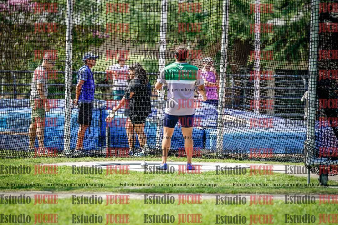 Fotos del lanzamiento de martillo de mujeres y varones