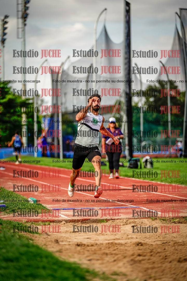 Fotos del salto en largo de varones