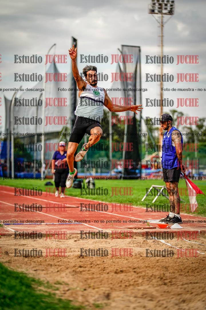 Fotos del salto en largo de varones