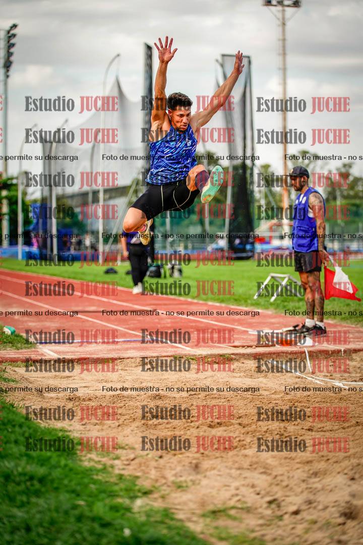 Fotos del salto en largo de varones