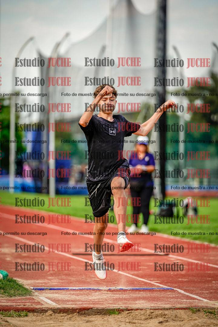 Fotos del salto en largo de varones