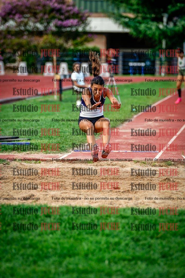 Fotos del salto en largo de mujeres
