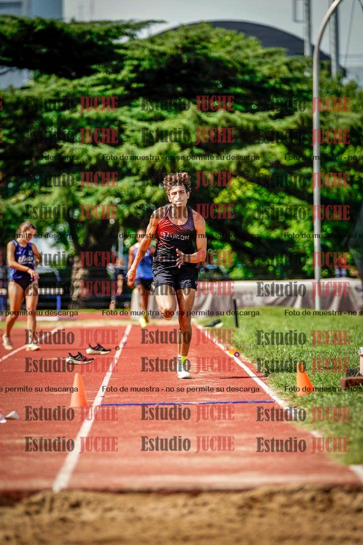 Fotos del salto triple de mujeres y varones