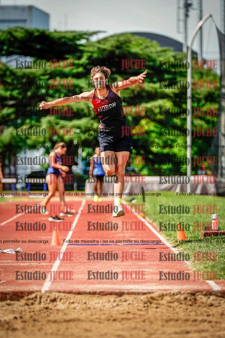 Fotos del salto triple de mujeres y varones