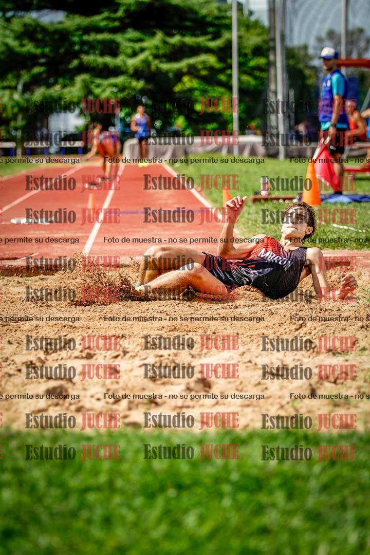 Fotos del salto triple de mujeres y varones