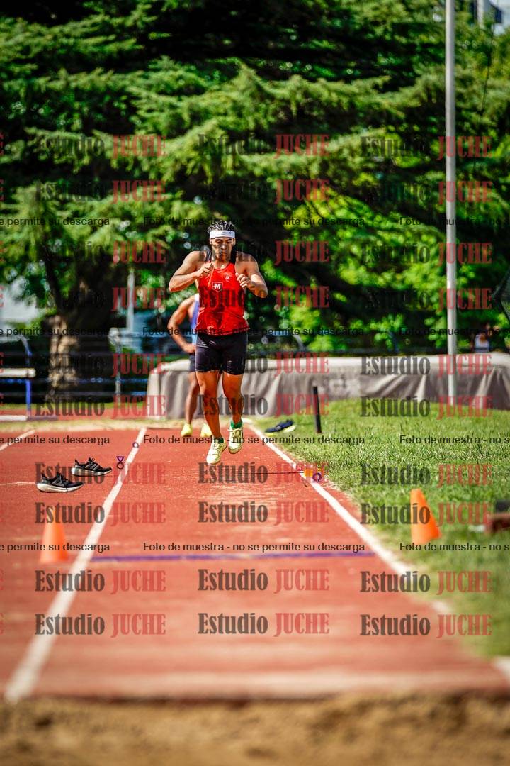 Fotos del salto triple de mujeres y varones
