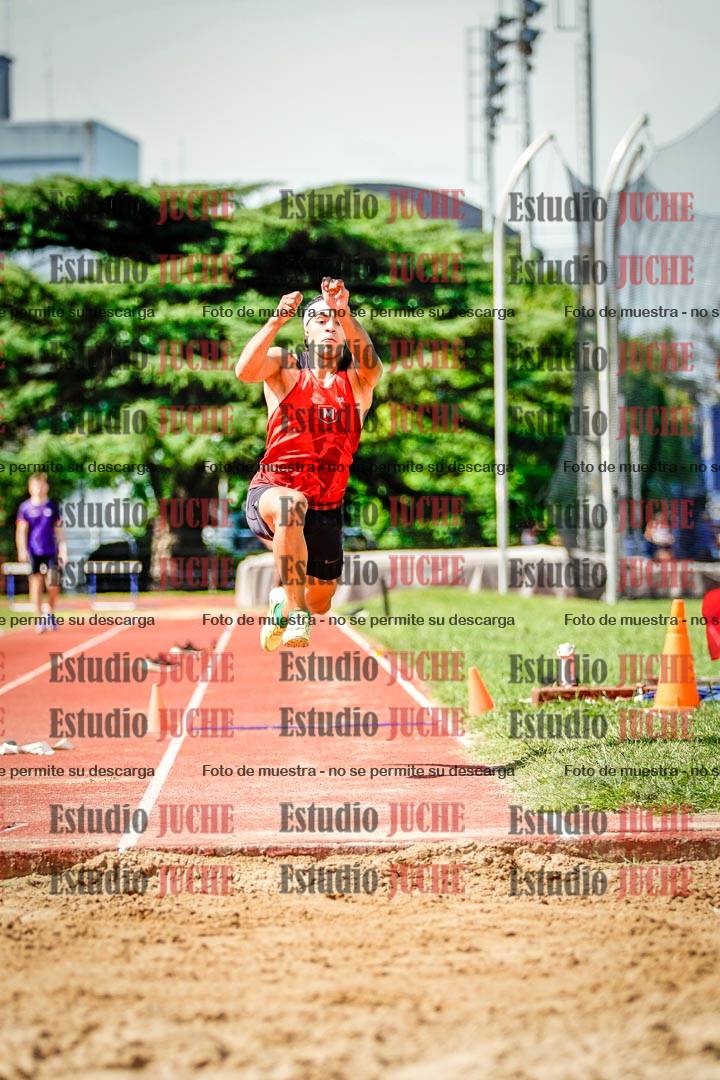 Fotos del salto triple de mujeres y varones