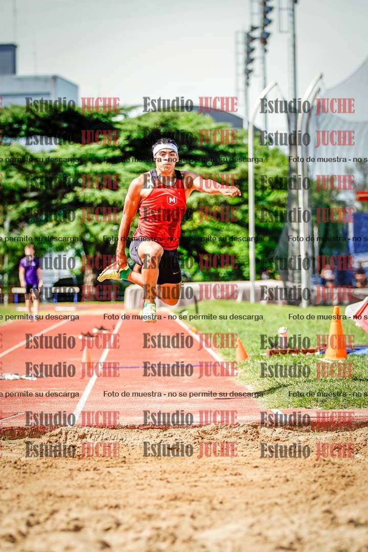 Fotos del salto triple de mujeres y varones