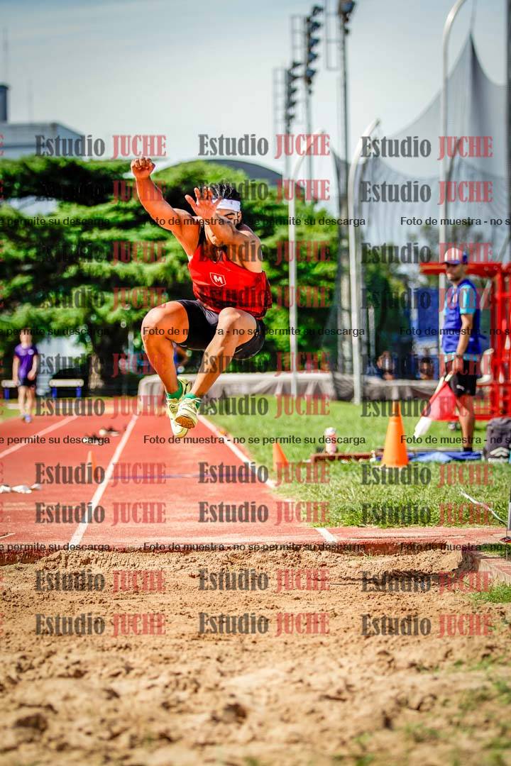 Fotos del salto triple de mujeres y varones