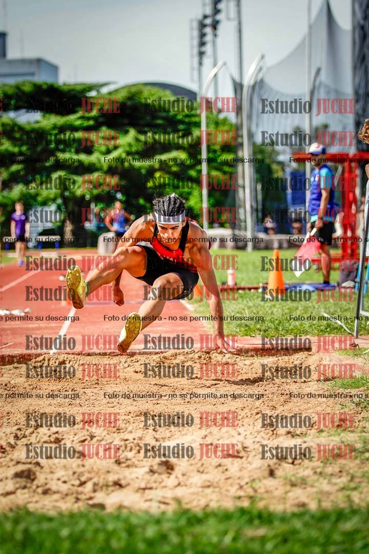 Fotos del salto triple de mujeres y varones