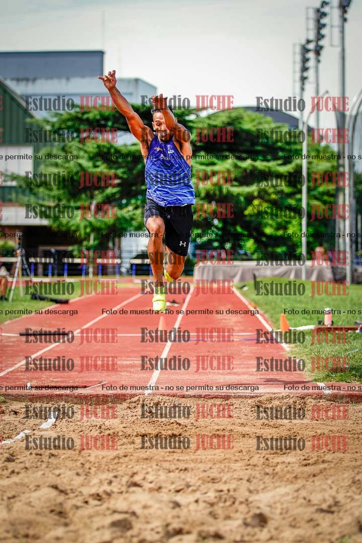 Fotos del salto triple de mujeres y varones