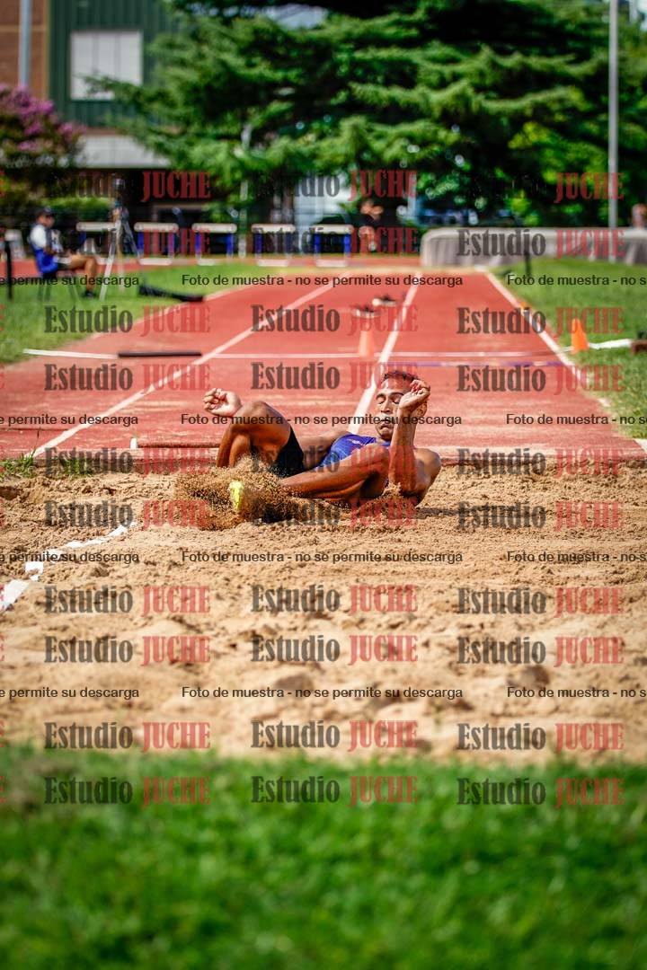 Fotos del salto triple de mujeres y varones