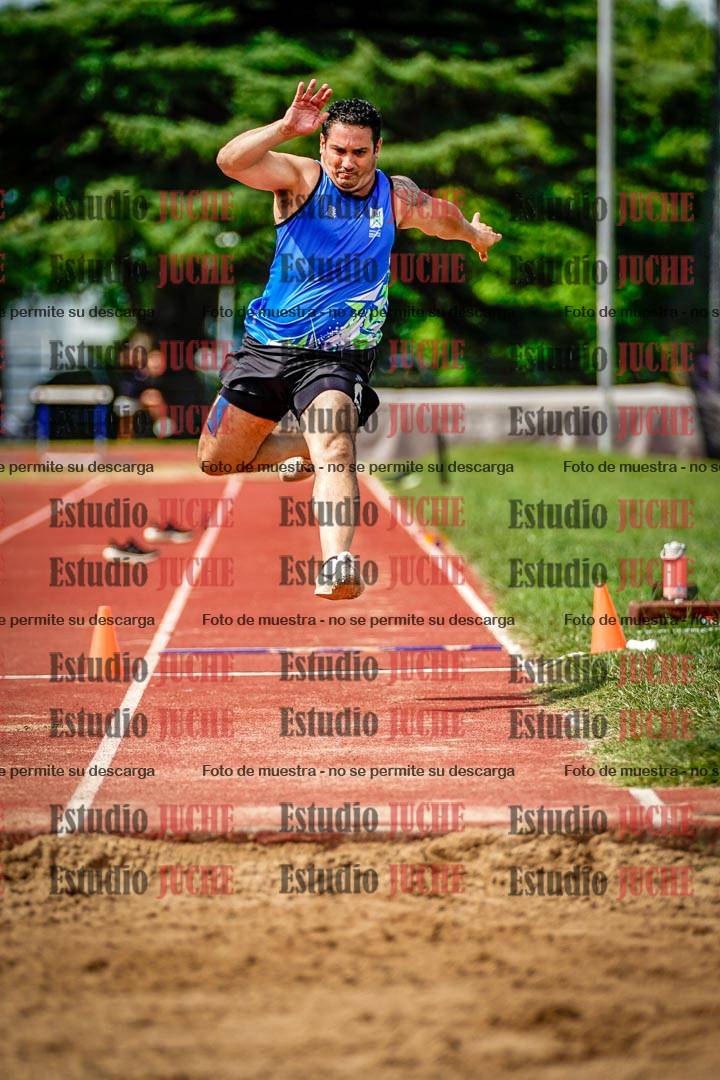 Fotos del salto triple de mujeres y varones