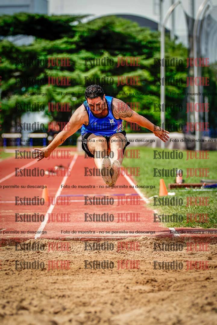 Fotos del salto triple de mujeres y varones
