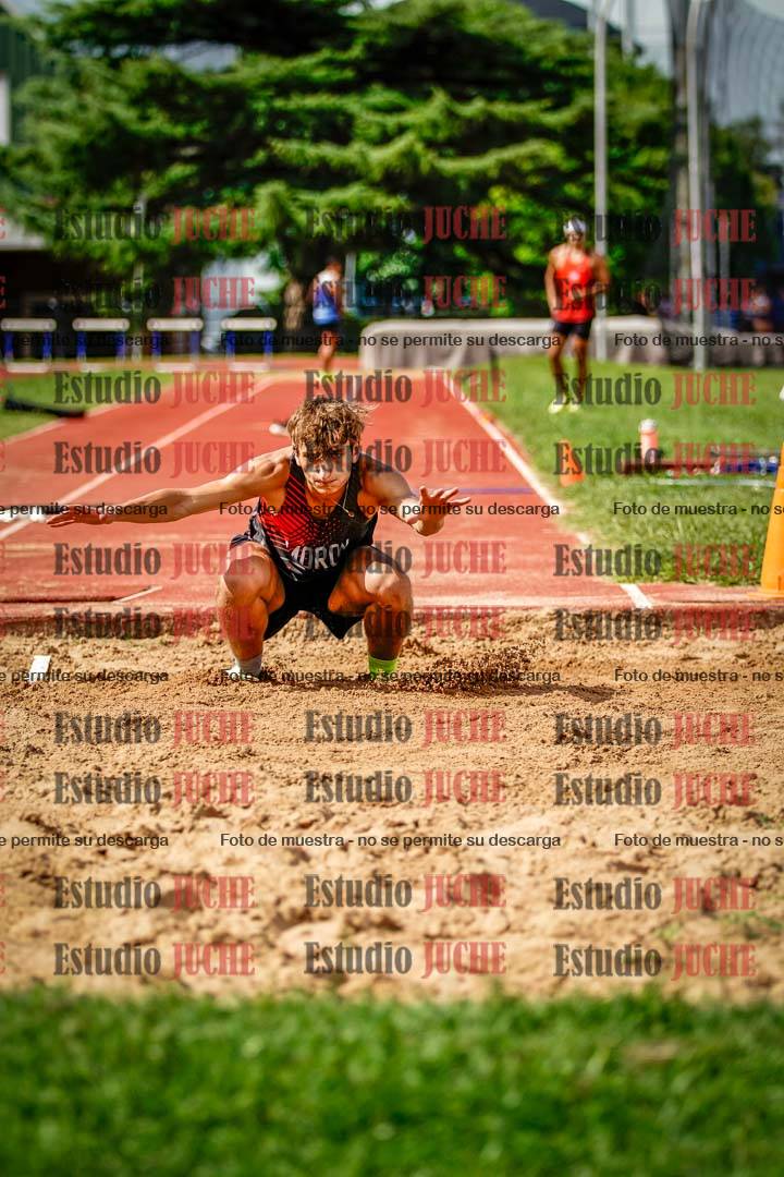 Fotos del salto triple de mujeres y varones