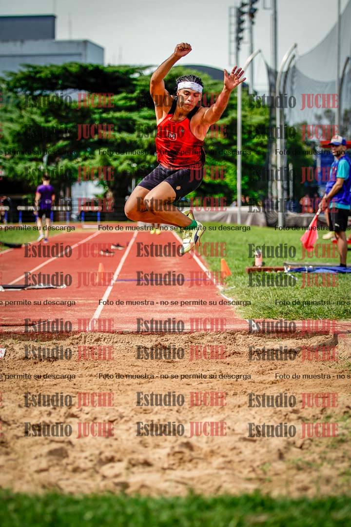 Fotos del salto triple de mujeres y varones