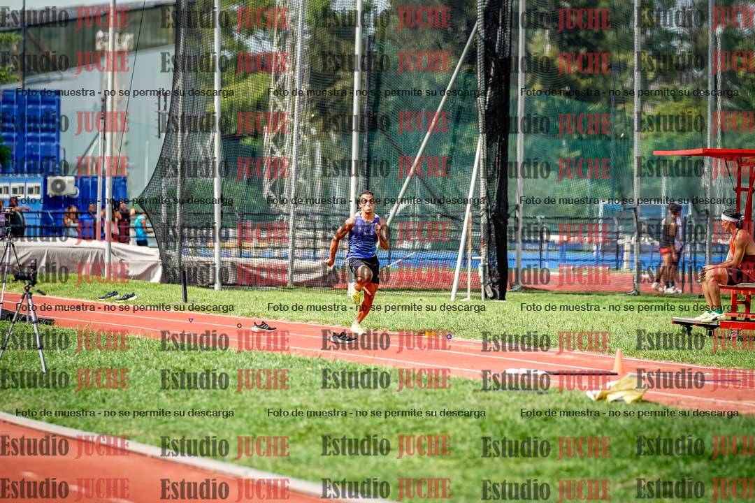 Fotos del salto triple de mujeres y varones